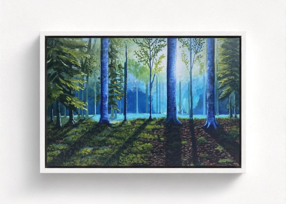 deer in serene forest with white frame